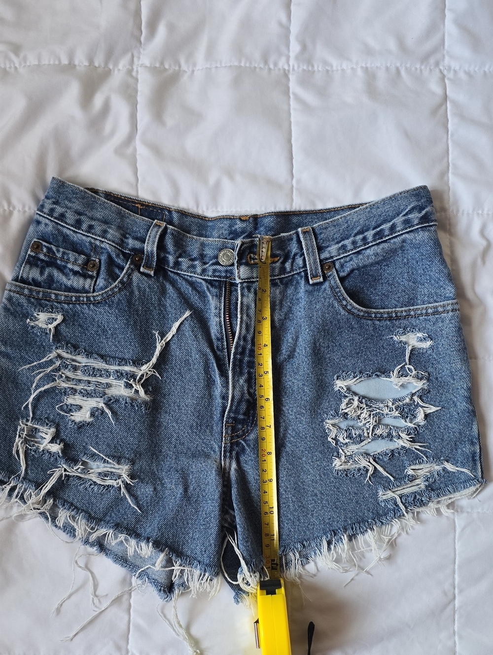 Levi's 550 Distressed Light Blue Denim Cutoff Shorts